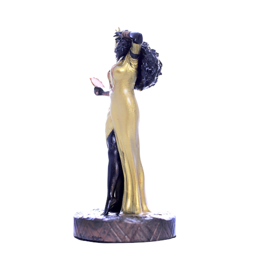 Terreiro Chão de Oya hand-crafted resin statue of Oxum Orixá in a gold dress holding a fan, side view.