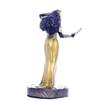 Terreiro Chão de Oya hand-crafted resin statue of Oxum Orixá in a gold gown holding a mirror, back view.