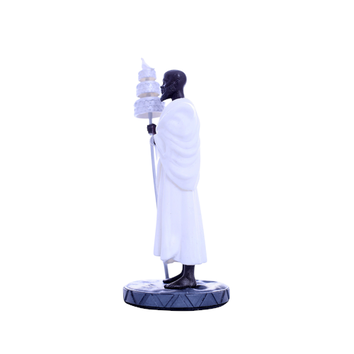 Terreiro Chão de Oya handmade resin statue of Oxalá Orixá in white robes holding a ceremonial staff on a round base